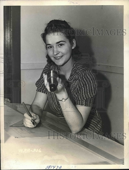 1940 Canada ammunition plant worker with parts  - Historic Images