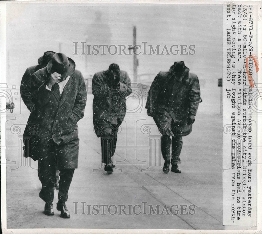1950 Citizens walk in 50 MPH hour winds & snow in Chicago, Ill. - Historic Images