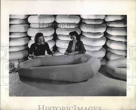 1943 Firestone Employees preparing with pararafts  - Historic Images