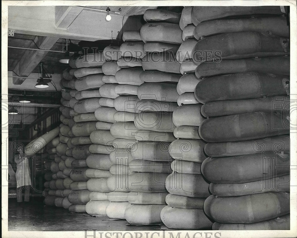 1943 Press Photo Stacks of Pararafts at Firestone - nea68781-Historic Images