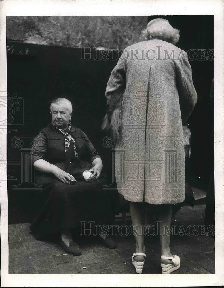 1945 Brussels Woman Makes Purchase from Street Vendor  - Historic Images