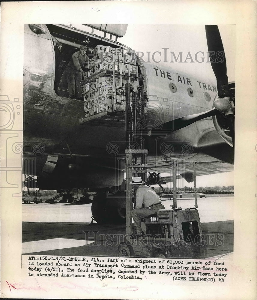 1948 Part Of Shipment Of 60,000 Pounds Of Food Loaded Into Airplane - Historic Images