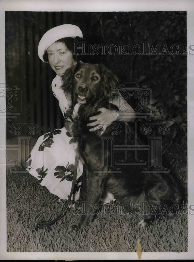 1937 Mrs. Thomas Harden and her dog &quot;Brownie&quot; get no leash fine - Historic Images