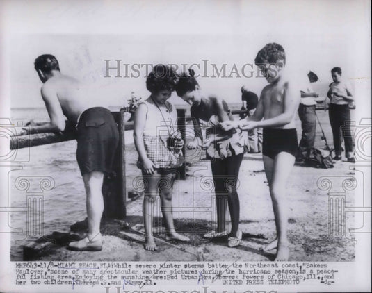 1953 Miami Beach, Fla. tourists & children enjoy the beach - Historic Images