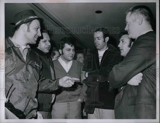 1970 Men on Patio  - Historic Images