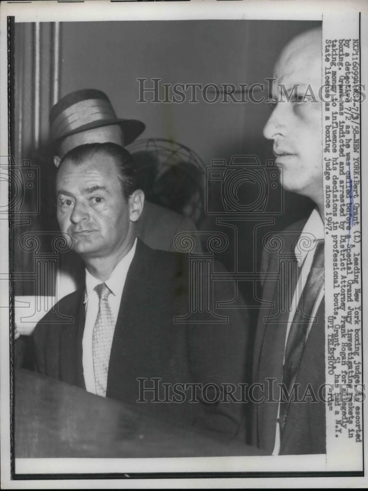 1958 Bert Grant, Boxing Judge allegedly take money in his decision. - Historic Images