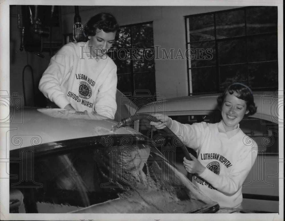 1957 D Klimnayk &amp; N Williamson of Lutheran Hospital wash cars - Historic Images