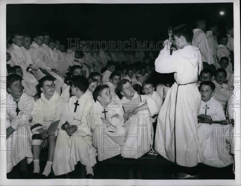 1956 Choir Boy Snaps Photo at Sixth World Congress in Paris - Historic Images