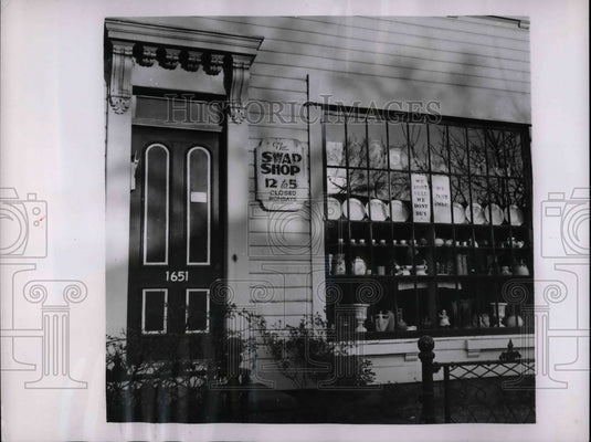 1955 Mrs Blake O Connor owner of Swap Shop, shop for trading items - Historic Images