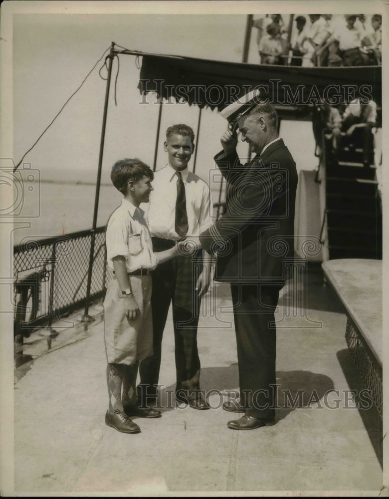 1936 Capt. Neil McPhail with W.M. Oall and Hutin Chaney  - Historic Images