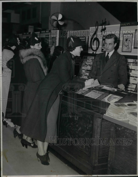 1936 Girl checker copies sales tabulations of a sheet music clerk - Historic Images