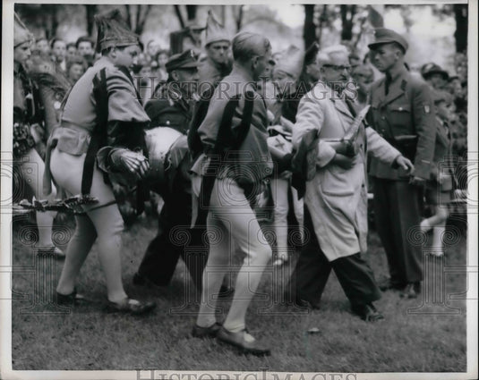 1956 Press Photo A knight knocked down in the jousting match - nea70949 - Historic Images