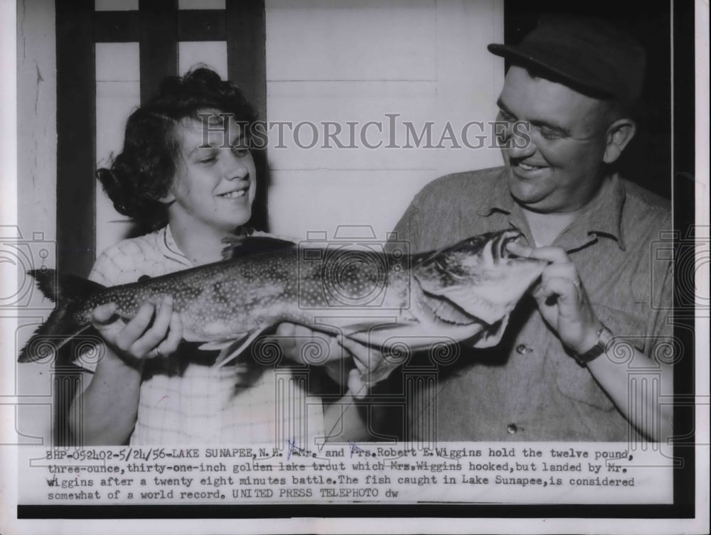 1956 Mr. and Mrs. Robert Wiggins after fishing  - Historic Images