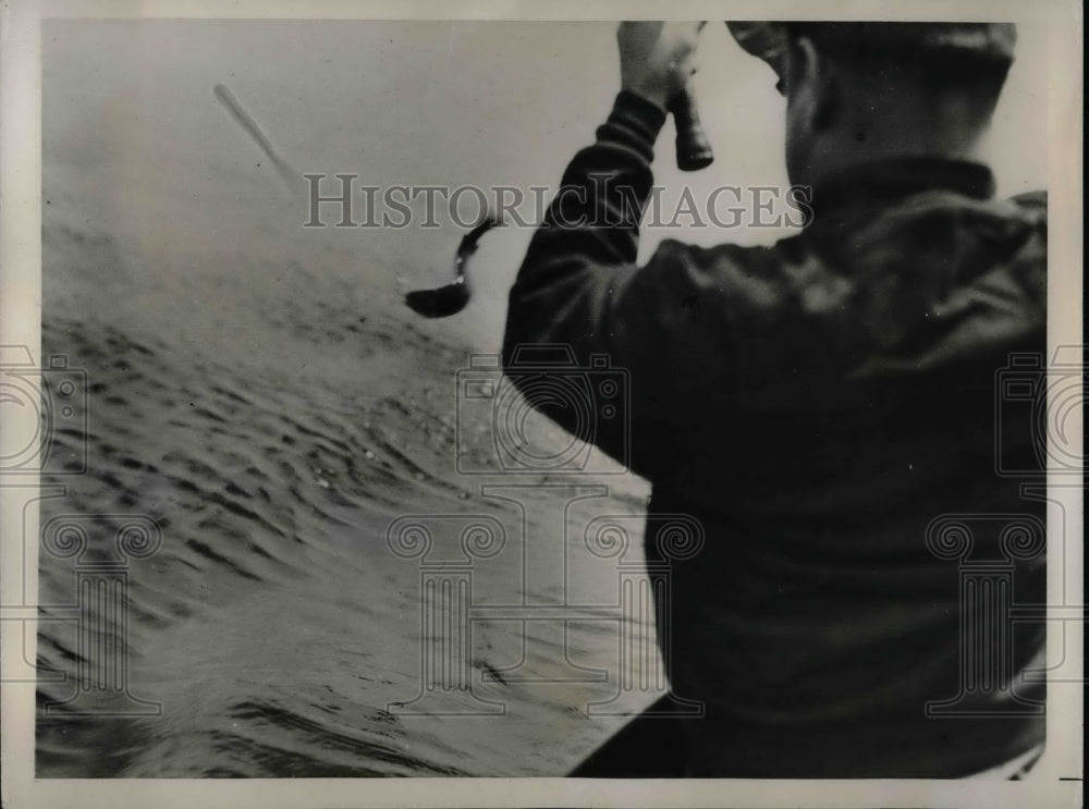 1936 Conrad Wirth fishing on a lake  - Historic Images