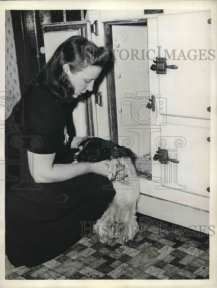 1943 Chicago, Ill. Mrs Oma Barton &amp; her dog at fridge son died in - Historic Images