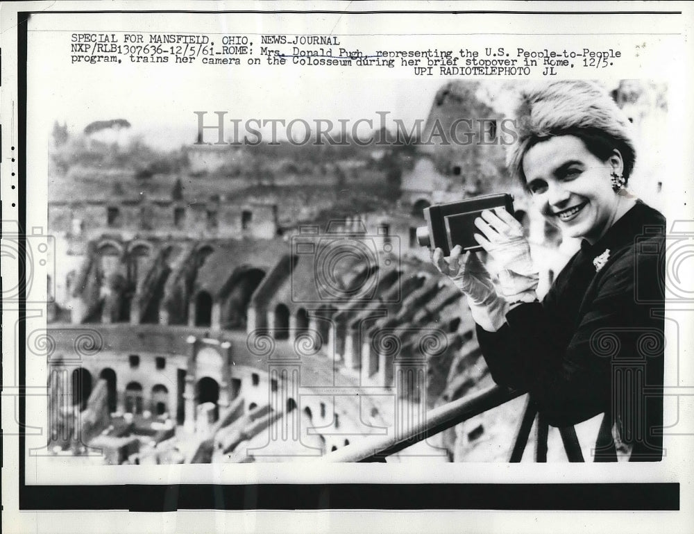 1961 Mrs Donald Pugh in Rome. Italy at the Coliseum  - Historic Images