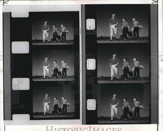 1965 Press Photo A golfer 7 two young boys as caddies - nea71606 - Historic Images