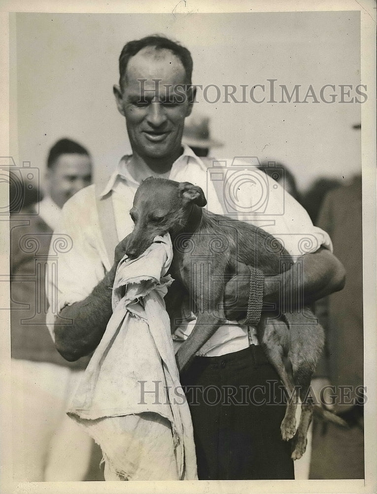 1927 Press Photo Perry Alexander is dog Cinders after race - nea72004 - Historic Images