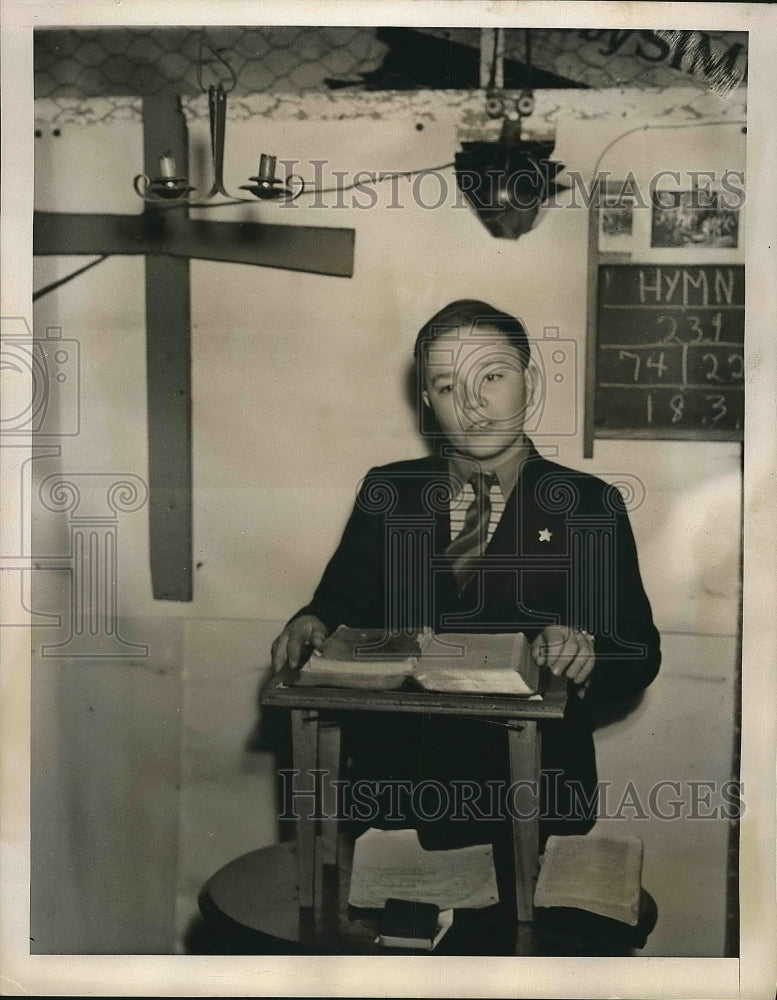 1939 Press Photo A young man in a preaching pulpit reads the service - nea72095 - Historic Images