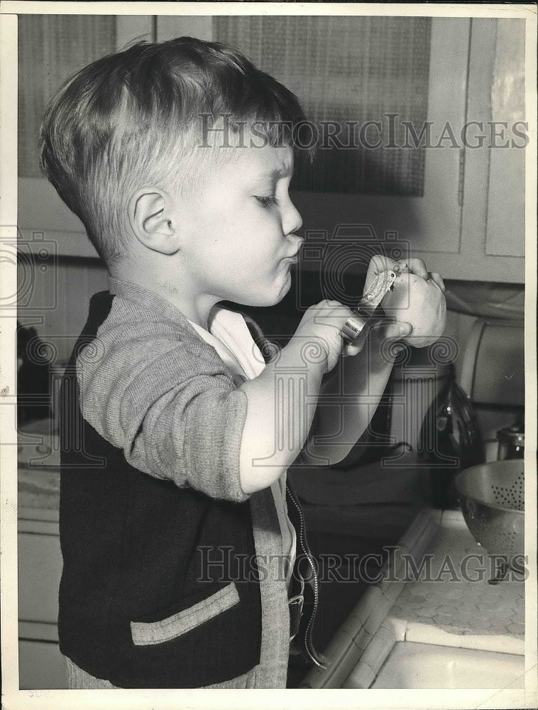 1943 San Francisco, Ca. Willard Hatch Jr peeling potatos  - Historic Images