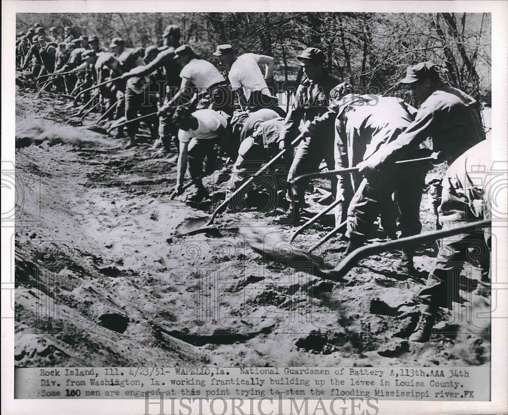 1951 Wapello, Iowa, Natl Guard builds levees against flooding - Historic Images