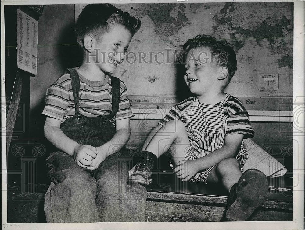 1947 Robert Miron and his brother Pat after being found abandoned - Historic Images