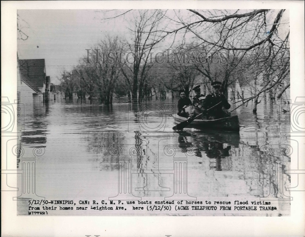 1950 R.C.M.P. using boats flood rescue Winnepeg Canada  - Historic Images