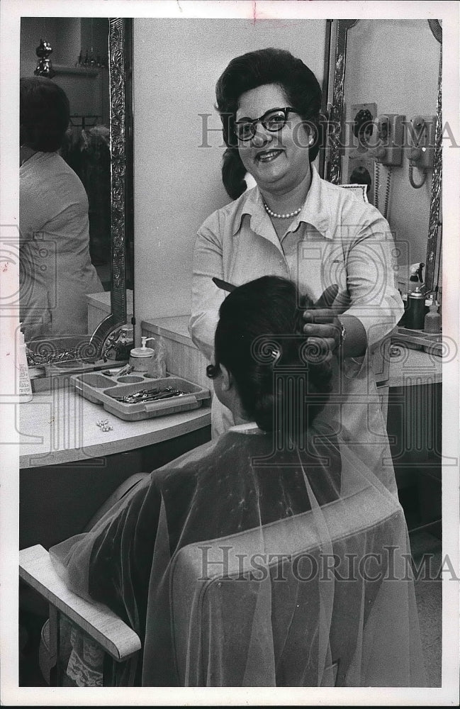 1969 Beautician working on customers there  - Historic Images
