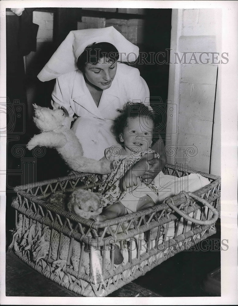 1956 Michael Bardy Nurse After plane trip from Egypt  - Historic Images