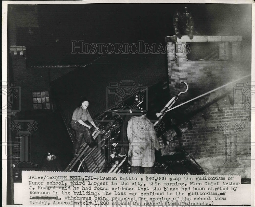 1947 Press Photo Firemen battling a fire at a school - nea72547 - Historic Images