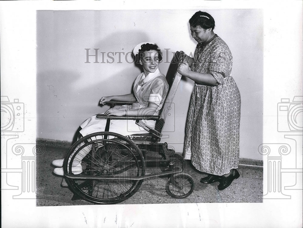 1956 Press Photo Dorothy Mae Stevens Pushing Wheelchair, Recovering from Injury - Historic Images
