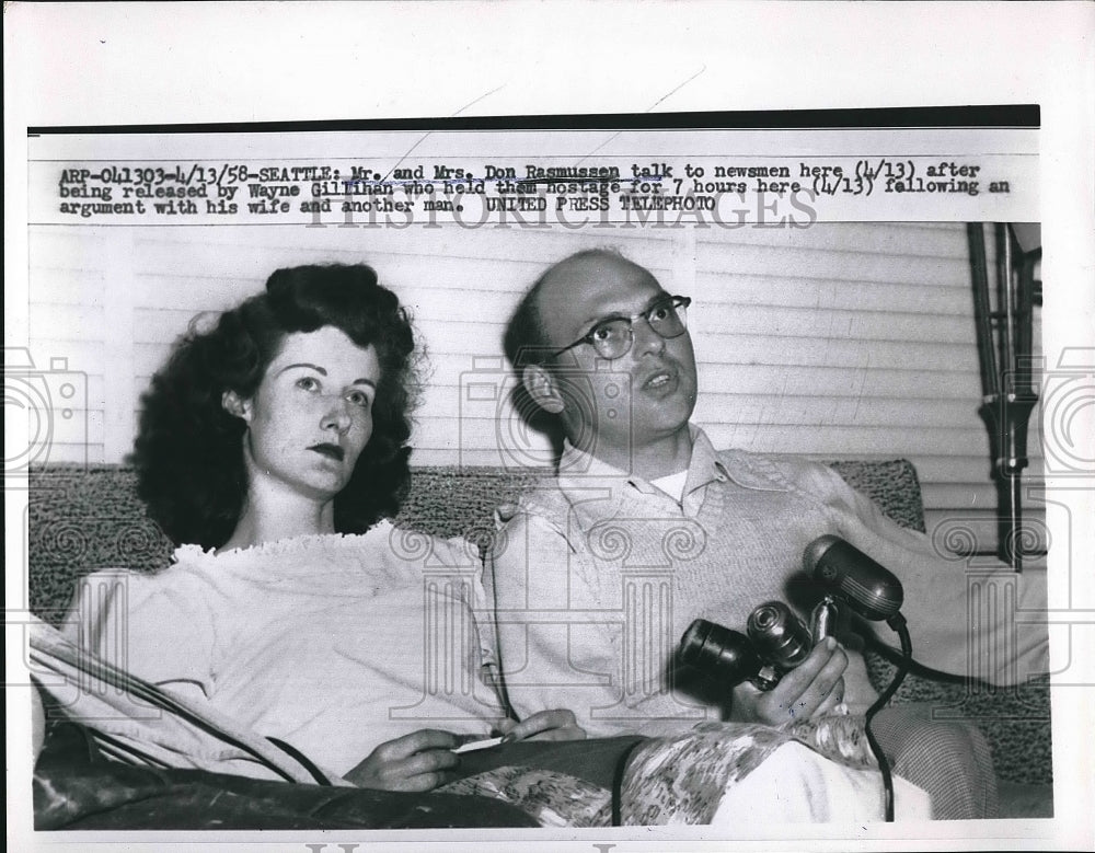 1958 Mr. and Mrs. Don Rasmussen speaking to reporters  - Historic Images