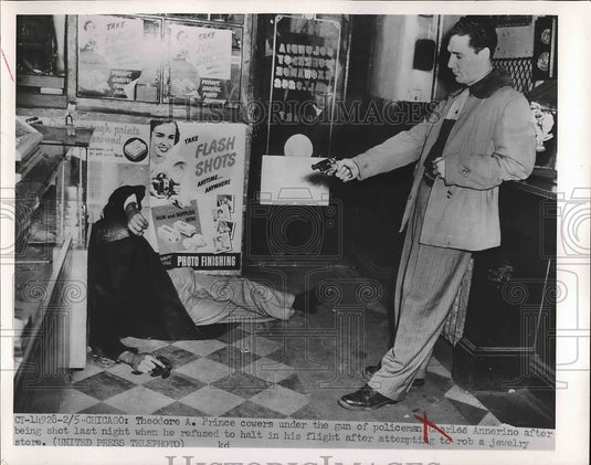 1952 Press Photo Cop Theodore Prince Holding Up Robber Charles Annerino - Historic Images