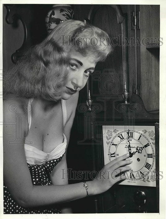 1958 Roberta Stevens Setting clock  - Historic Images