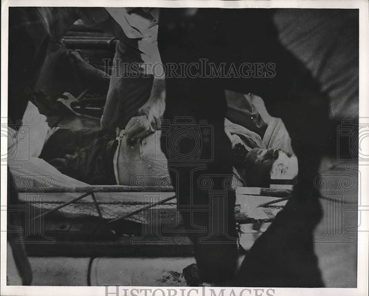 1952 Coast Guard Corpsman Treating Patient in Lifeboat  - Historic Images