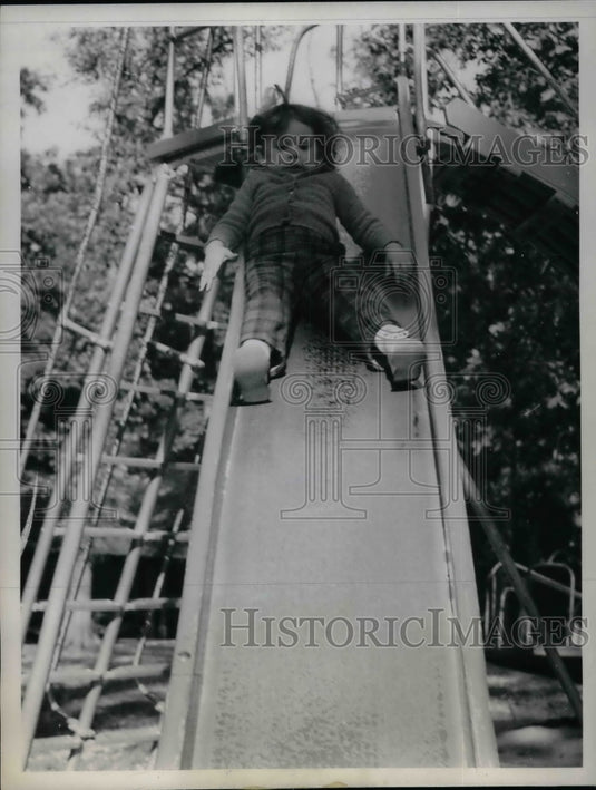 1961 Three Year Old Kris Richmond Makes First Trip on Sliding Board - Historic Images