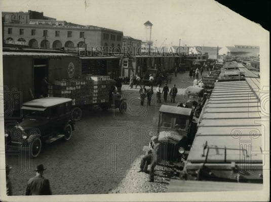 1925 Press Photo Trucks line up at a grape hauling firm - nea74509 - Historic Images