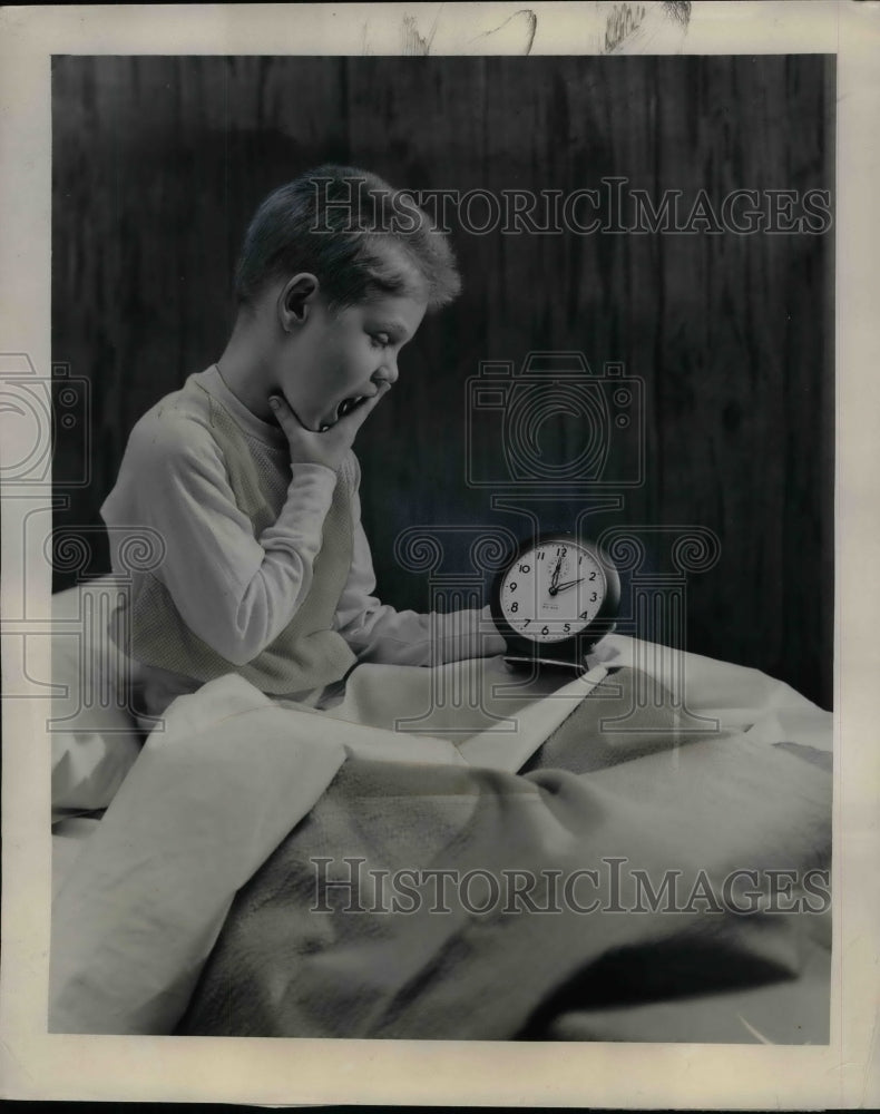 1953 Jock Macomber Sets Clock For Daylight Savings At 2:00PM - Historic Images