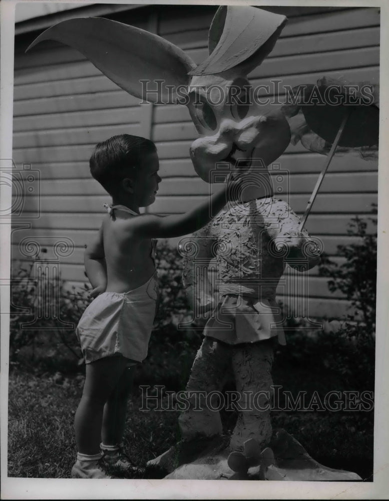 1946 David Shuttera, 3, with a bunny  - Historic Images