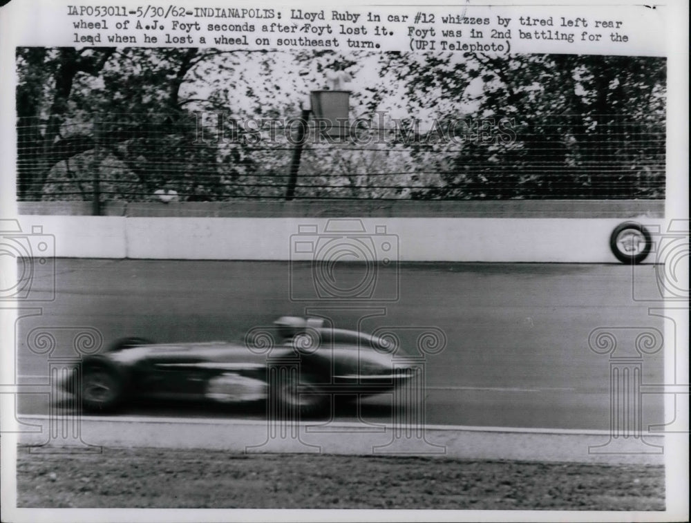 1962 Lloyd Ruby, car #12, passes wheel of A. J. Foyt, Indianapolis - Historic Images