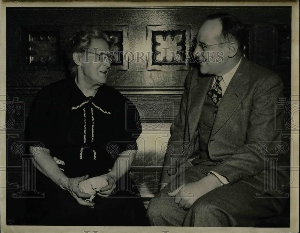1950 Mrs. Fannie Krug &amp; Dr. John Orillies Sitting Down &amp; Talking - Historic Images