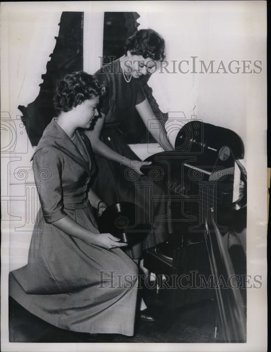 1957 Swedish Princesses Birgitta & Margaretha enjoying their records - Historic Images