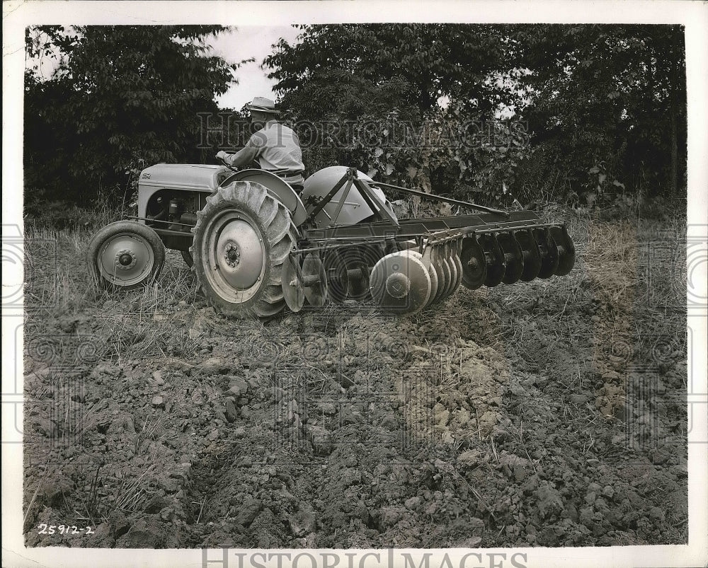 1948 Press Photo Tractor and Harrow at Work - nea76333-Historic Images