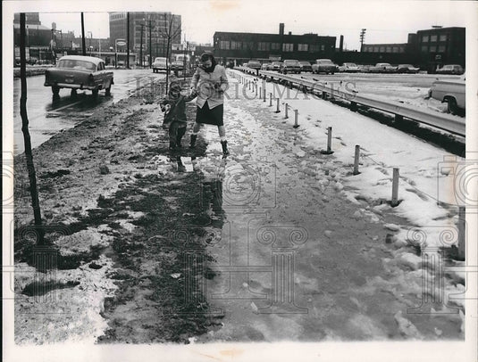 1962 Woman & Child Walk On E 21st Street Between Euclid & Chester - Historic Images