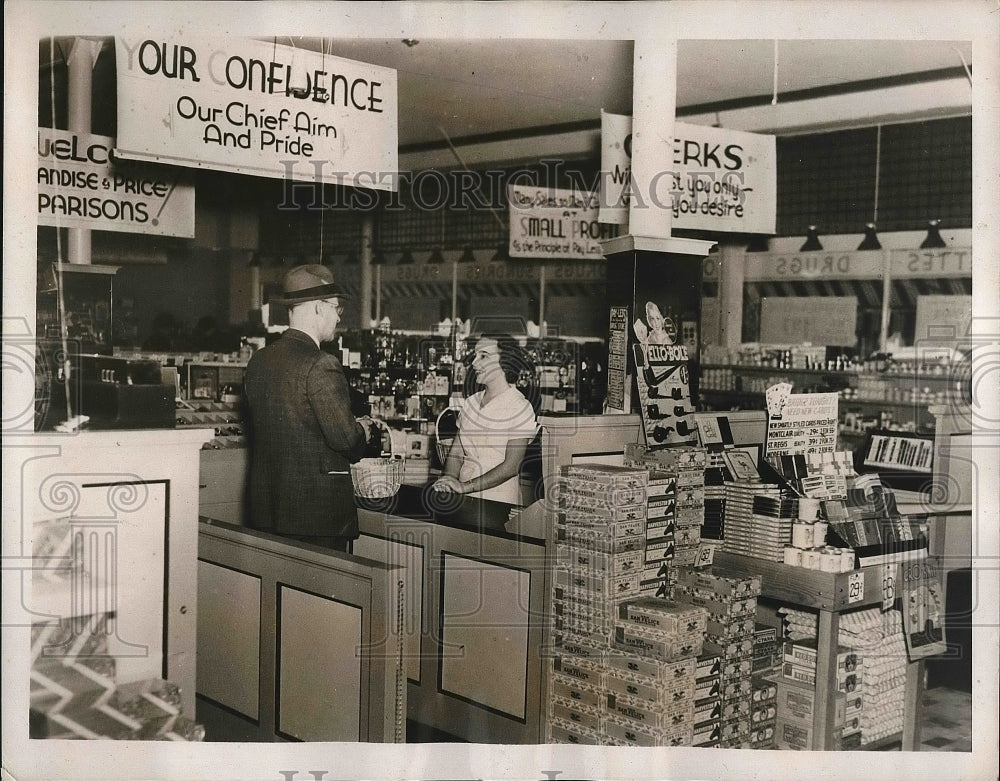 1937 Press Photo Rochester, Minn drugstore, G Hamiton jalled for price gouging - Historic Images