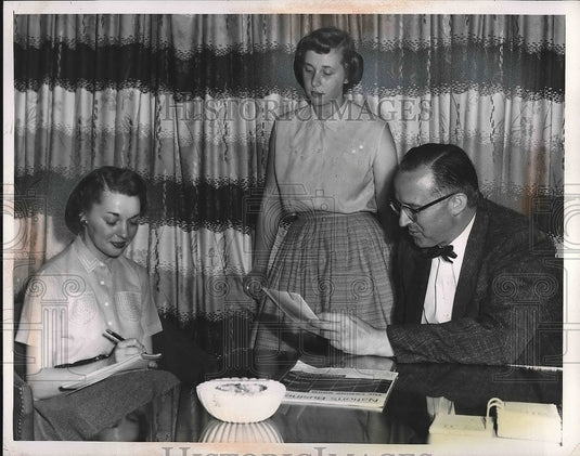 1955 Cliff Taylor, Manager of Ohio Fuel Gas with his Secretary. - Historic Images