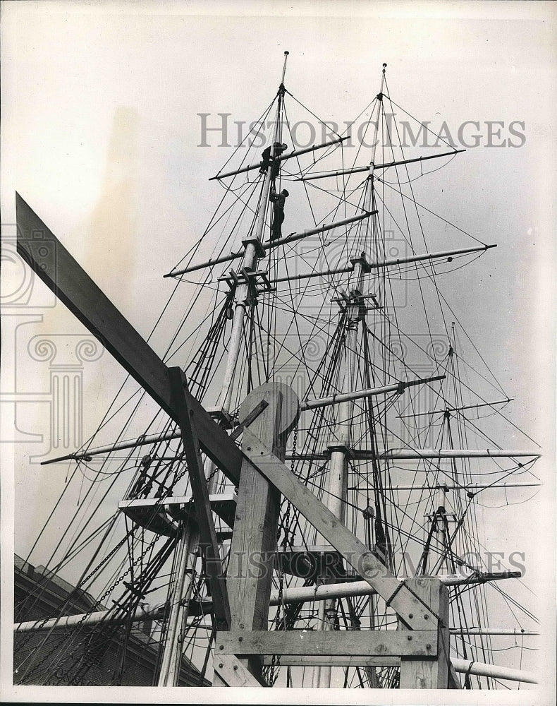 1939 TwoMan take down the rigging of the Yankee Clipper/  - Historic Images