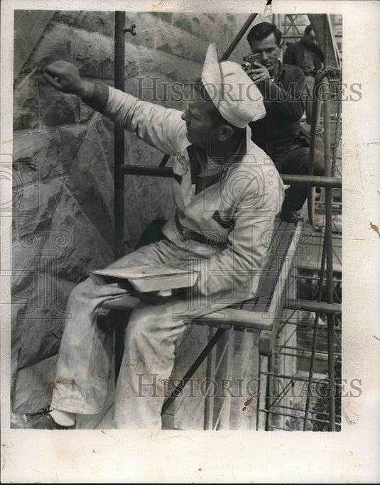 1955 R.J. Kunkle taking color movies of John Kauble's church work. - Historic Images