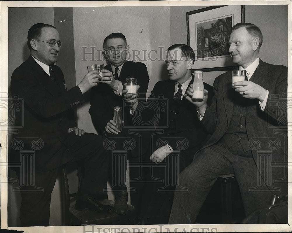 1935 Wyoming officials toast new state liquor laws with milk - Historic Images