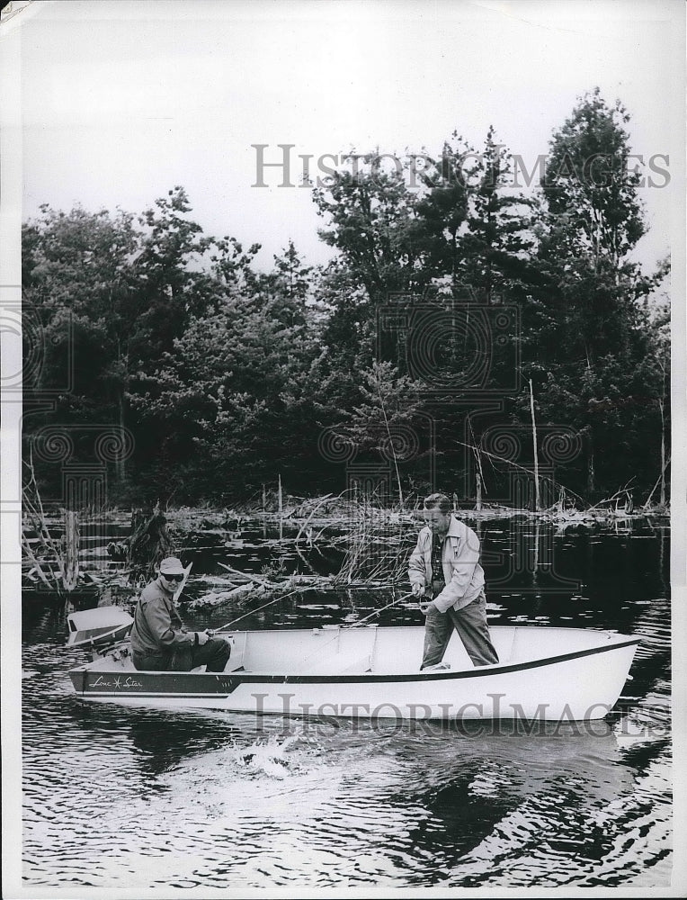 Press Photo Two Men Fishing In Light Aluminum Boat - nea78193 - Historic Images
